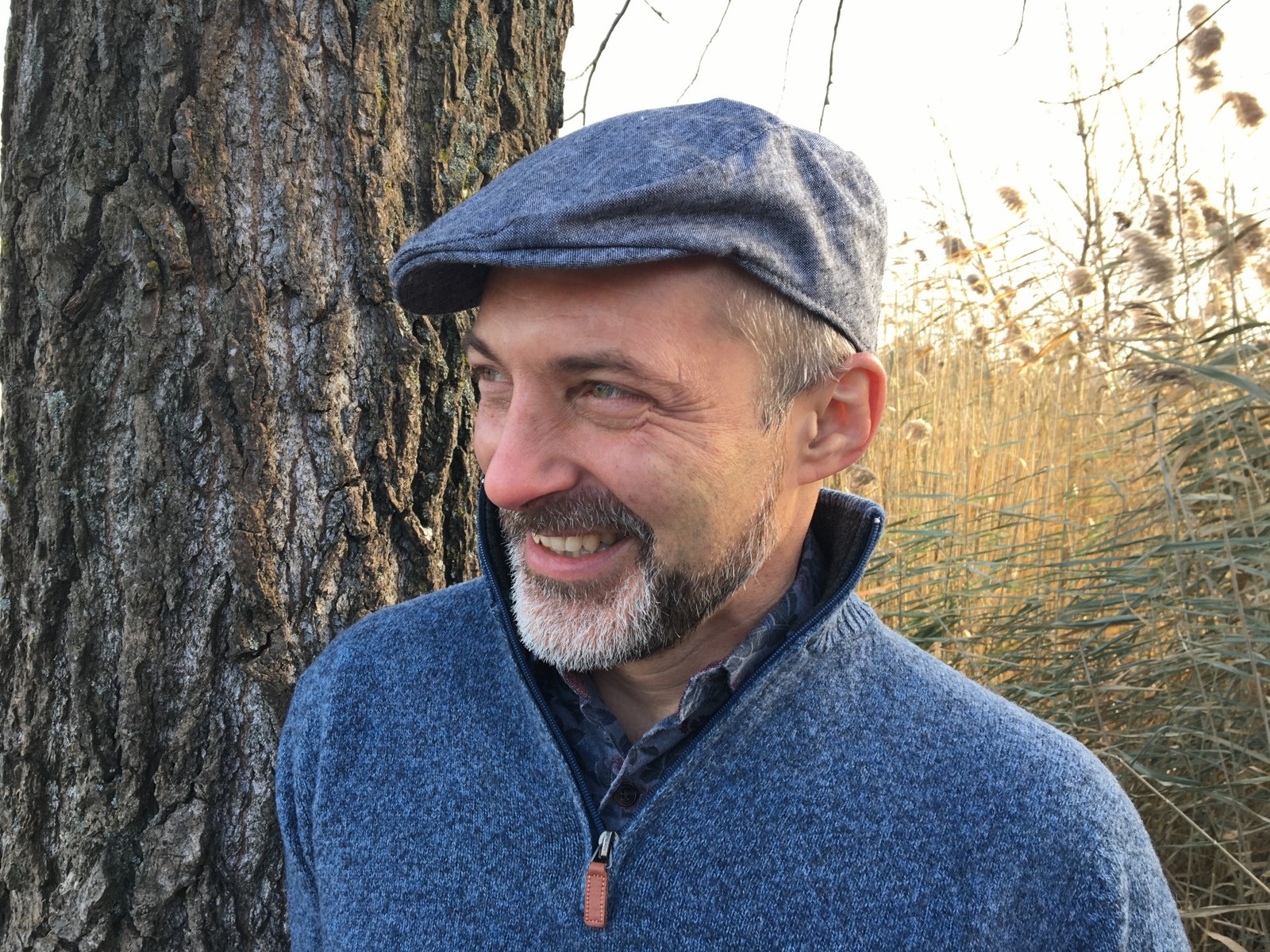 Jean-François Jodouin outdoors beside a tree